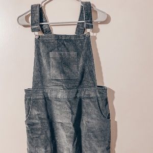 dark green overalls